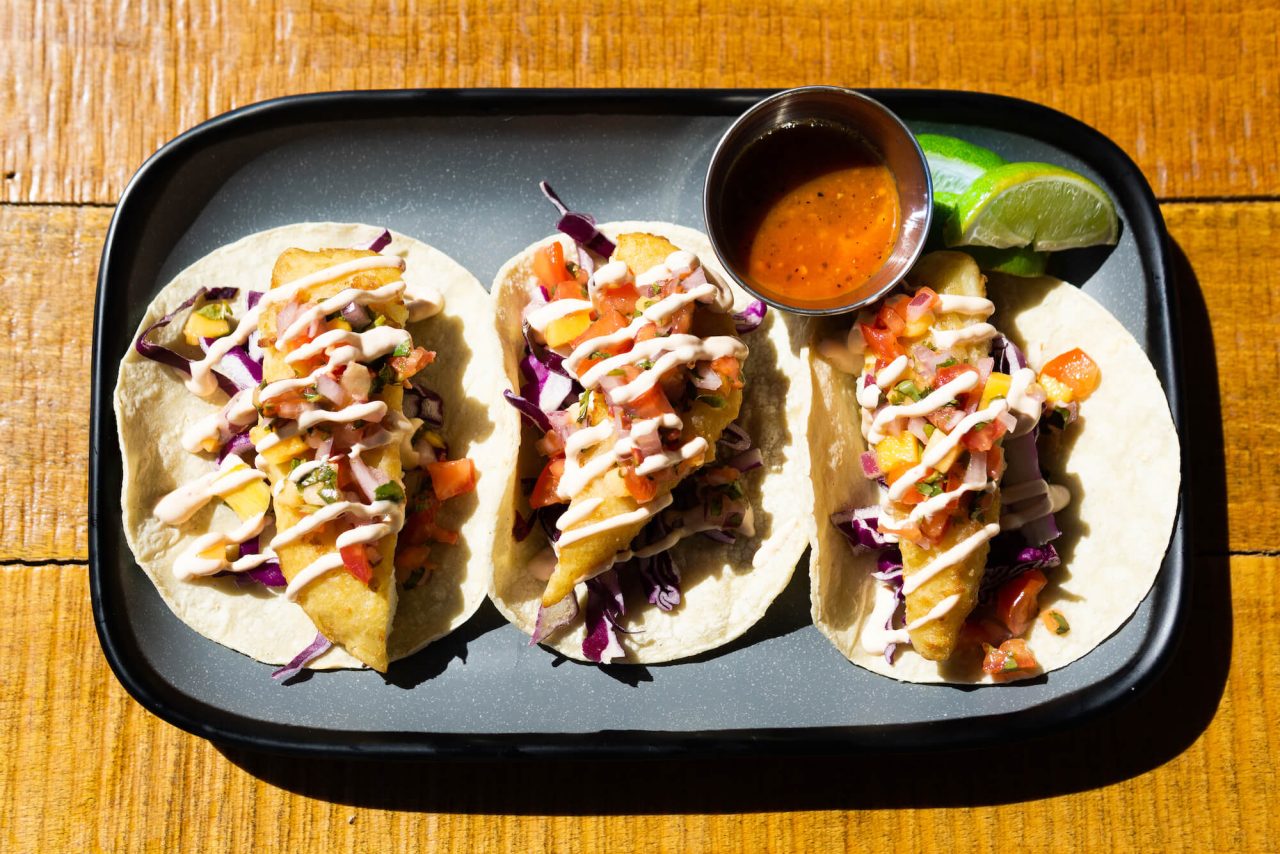 tray of three fish tacos